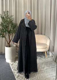 Close-up of the Zaya Denim Trenchcoat Black with denim details