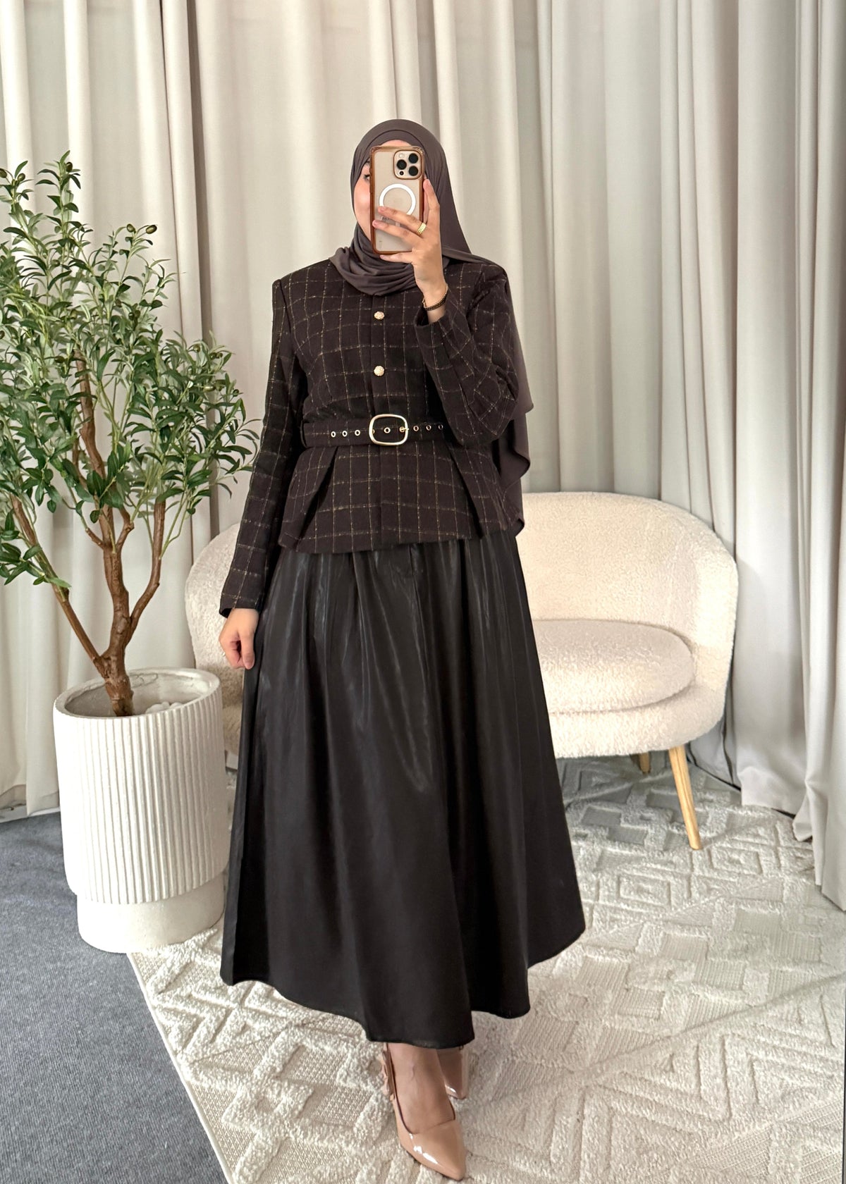 Full-length view of the Elara Faux Leather Skirt Dark Brown