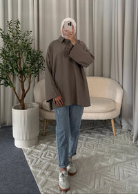Maya Oversized Polo Top Taupe styled with jeans for a relaxed everyday look