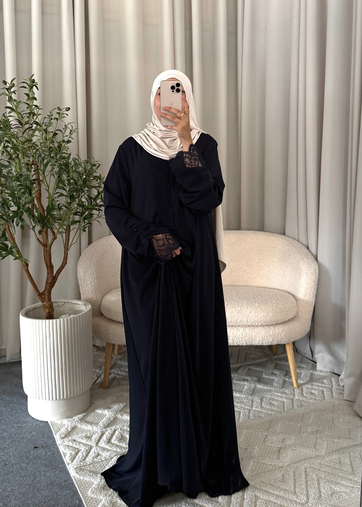 Full-length view of the Nayla Lace Abaya Navy Blue with flowy fit and lace cuffs