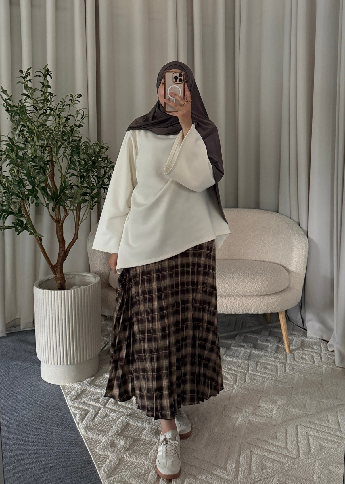 Pleated Check Skirt Brown with flowy pleats and classic check pattern