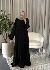 Raya Flow Abaya Black with a soft flowy fit and wide sleeves